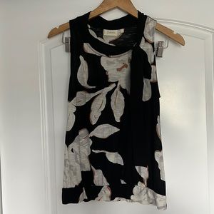 Stunning black and flower tie neck sleeveless top